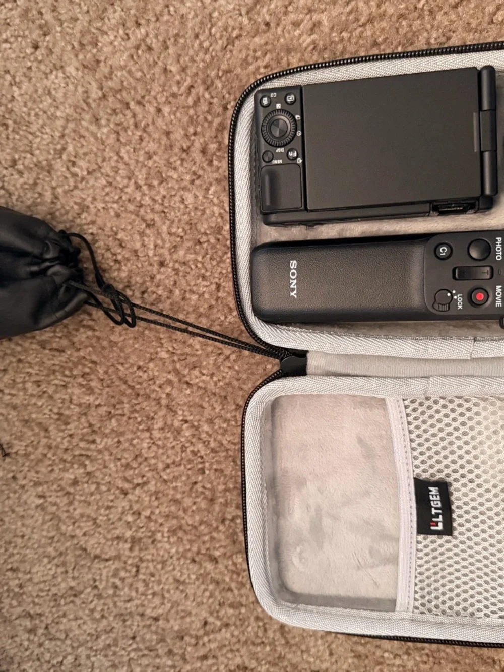 Sony Black Compact Point-and-Shoot Digital Camera with Lens Cap